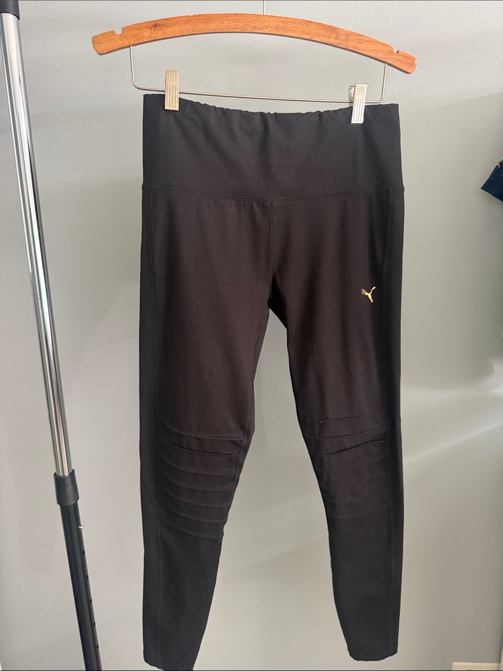 Puma Woman’s Black Leggings with Gold Puma Logo